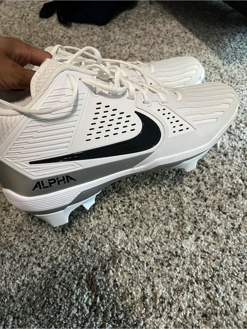 Nike Alpha Men's White Athletic Cleats with Black Swoosh